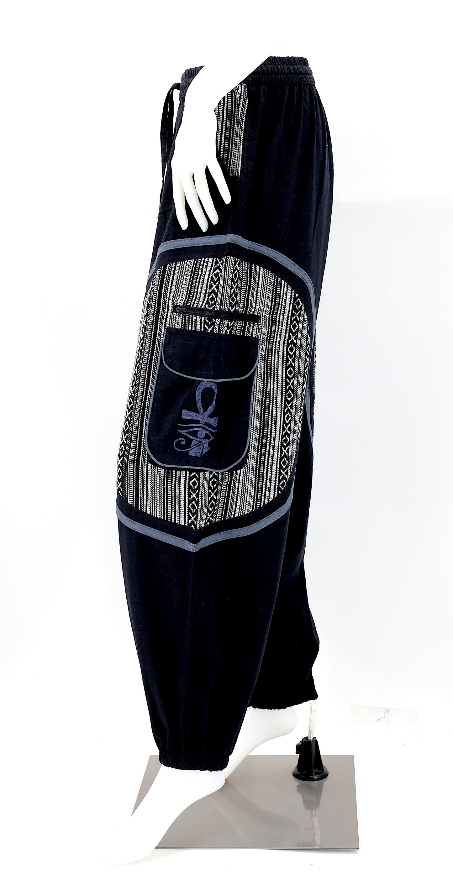 Side view of bohemian harem pants with ancient Egyptian motifs