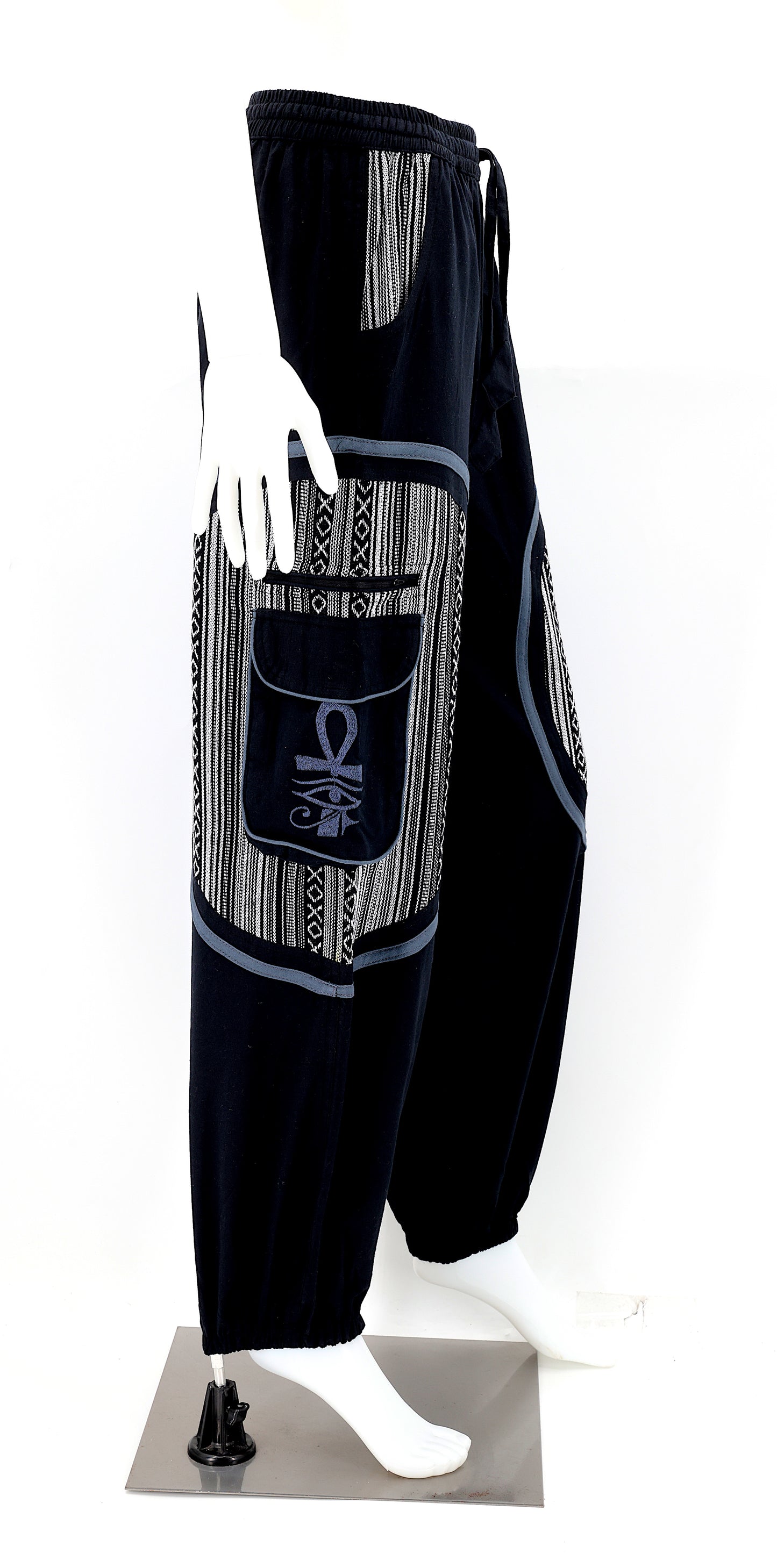 Side view of bohemian harem pants with ancient Egyptian motifs