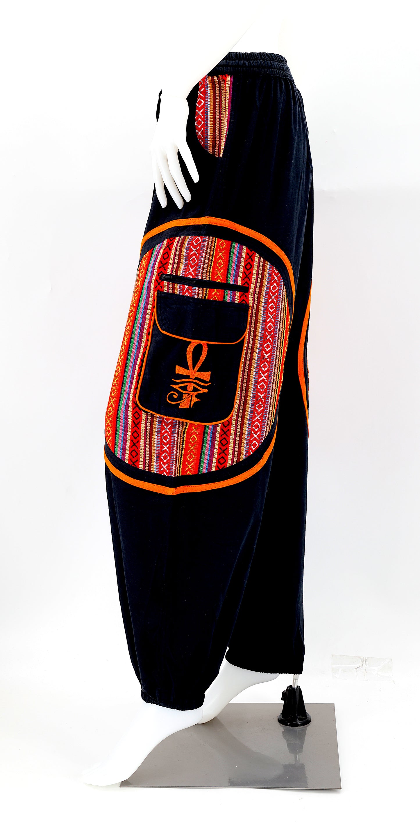 Side view of bohemian harem pants with ancient Egyptian motifs