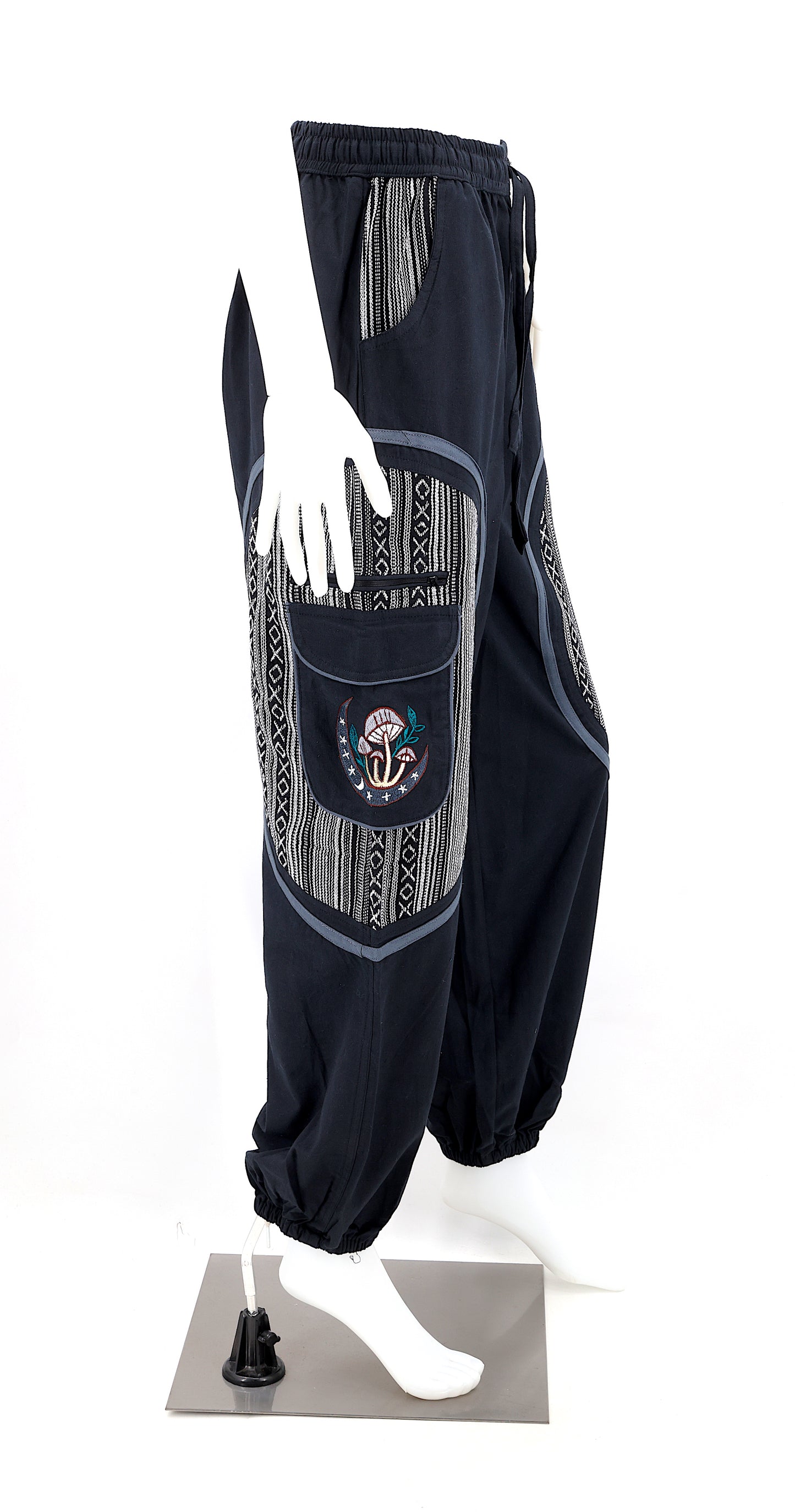 Side view highlighting secure zippered and buttoned pockets