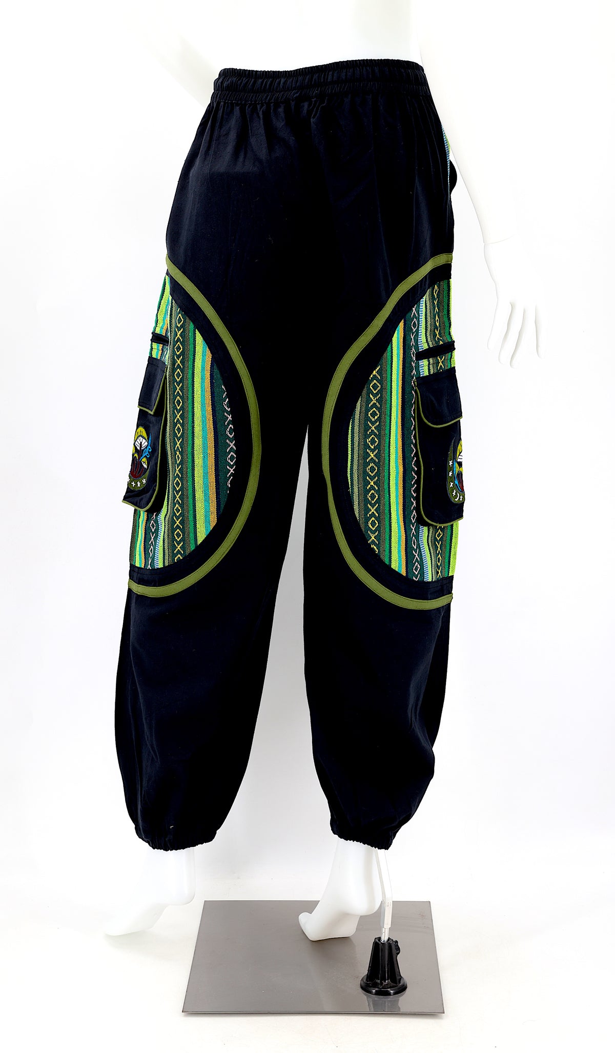 Back view of handmade moon and mushroom embroidered straight-leg harem pants