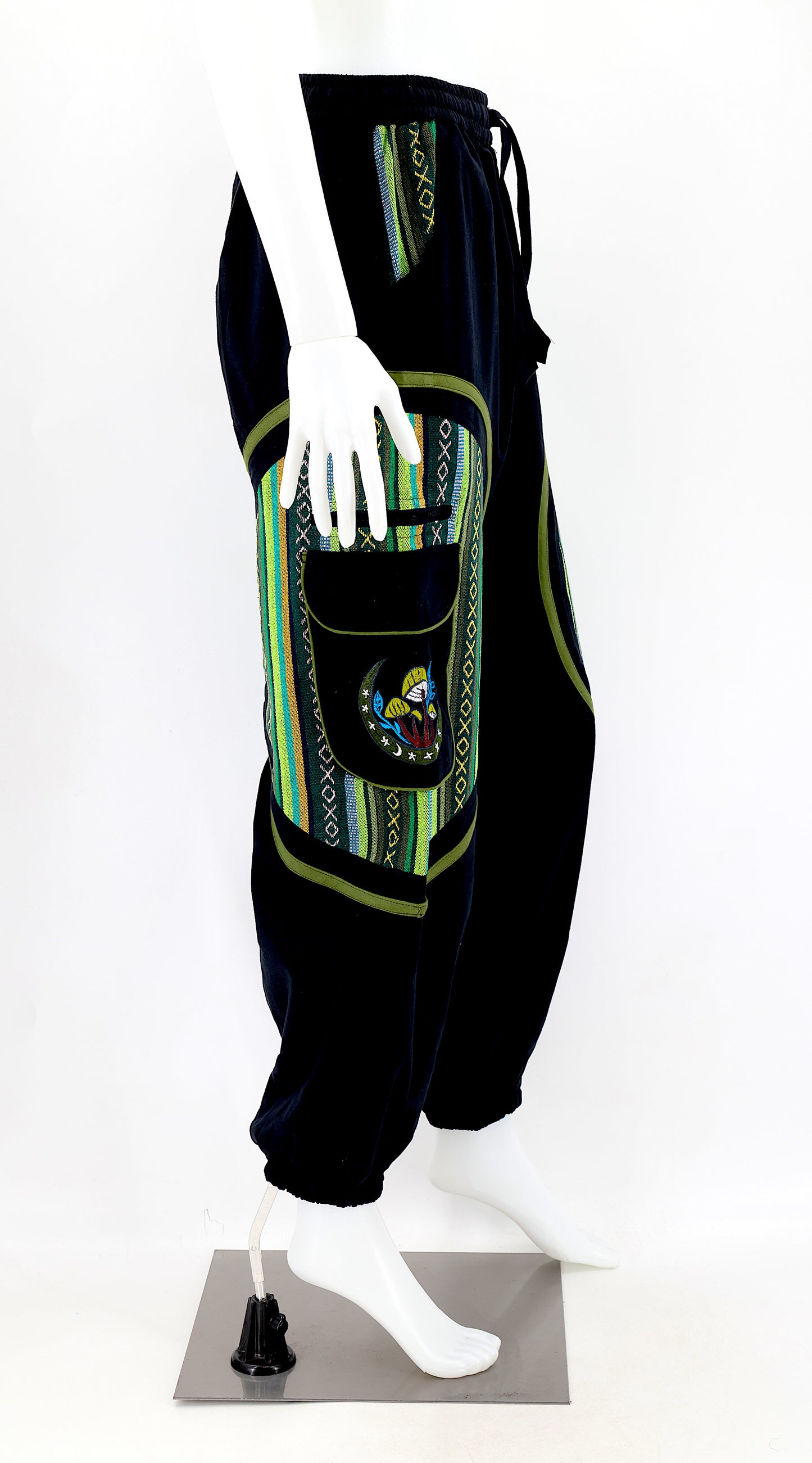 Side view highlighting secure zippered and buttoned pockets