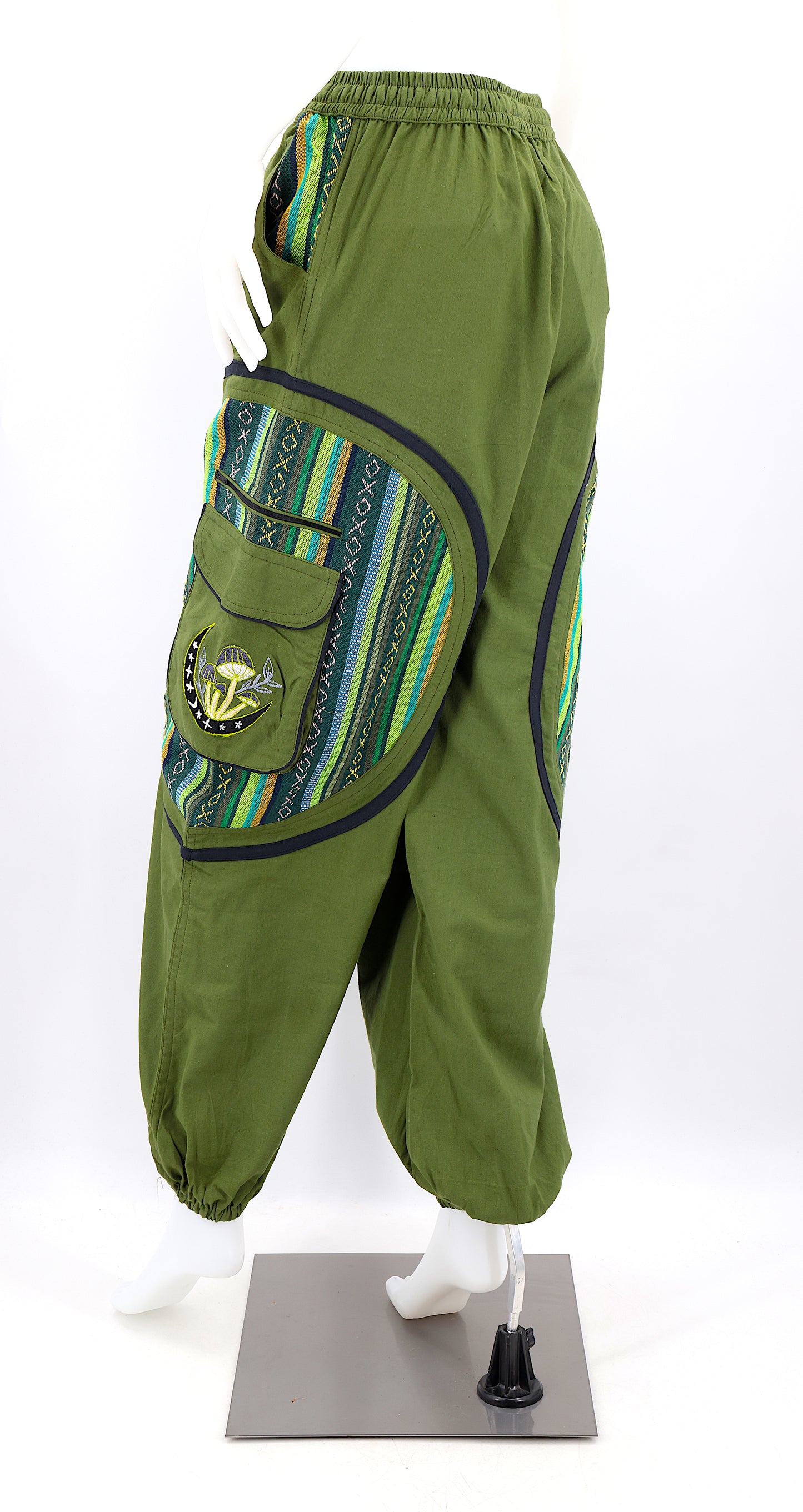 Back view of handmade moon and mushroom embroidered straight-leg harem pants