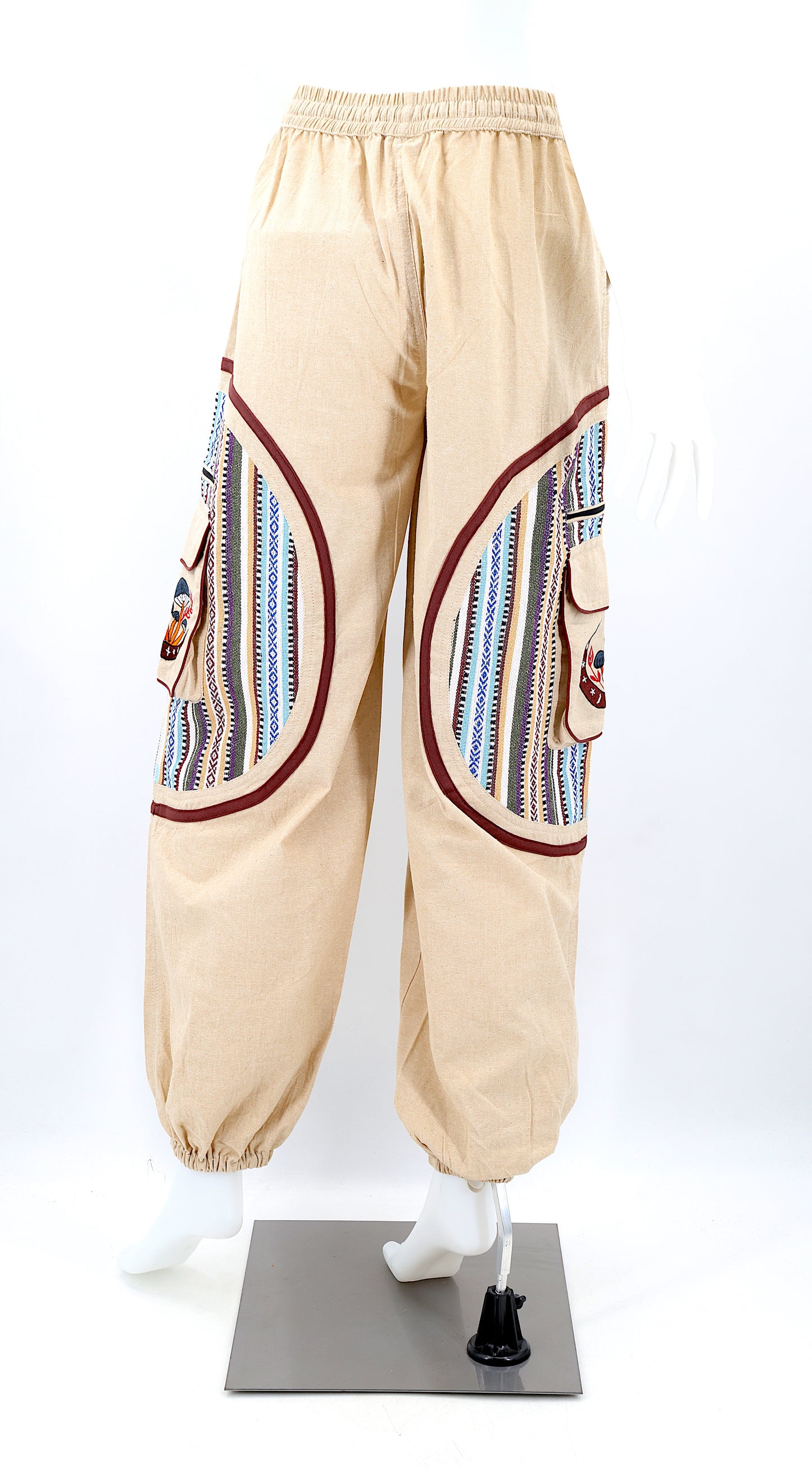 Back view of handmade moon and mushroom embroidered straight-leg harem pants