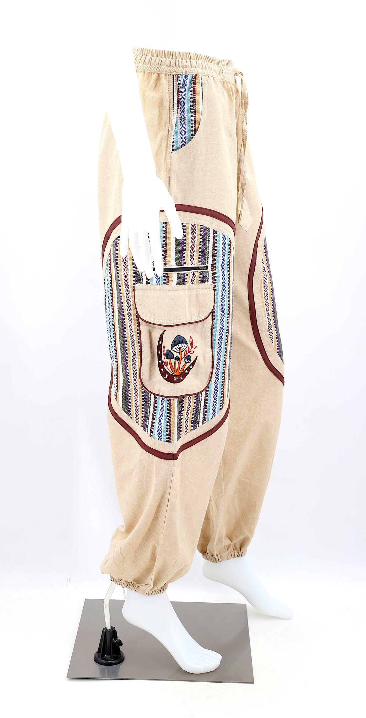 Side view highlighting secure zippered and buttoned pockets