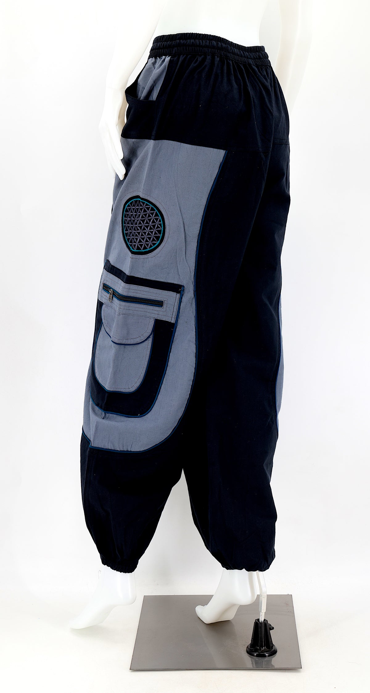 Back view of black gray Nepalese cotton harem pants with elastic waistband
