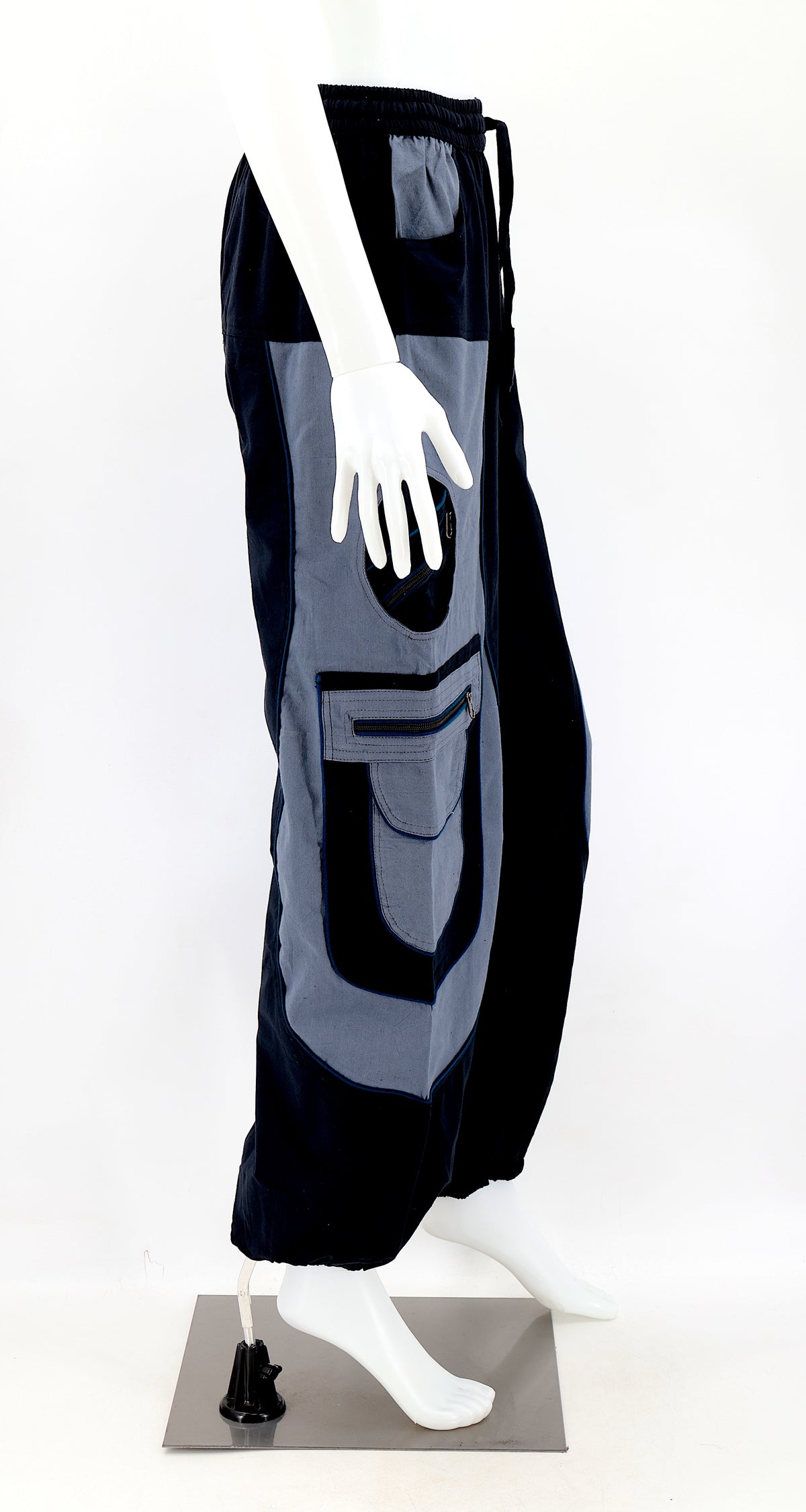 Side view showing relaxed fit and pocket detail of black gray boho harem trousers