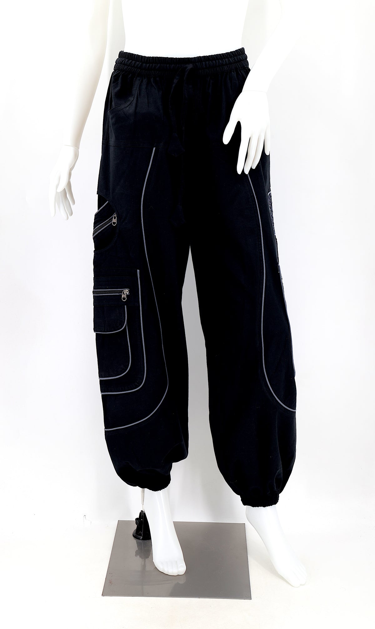 Front view of black handmade cotton harem pants with Flower of Life embroidery