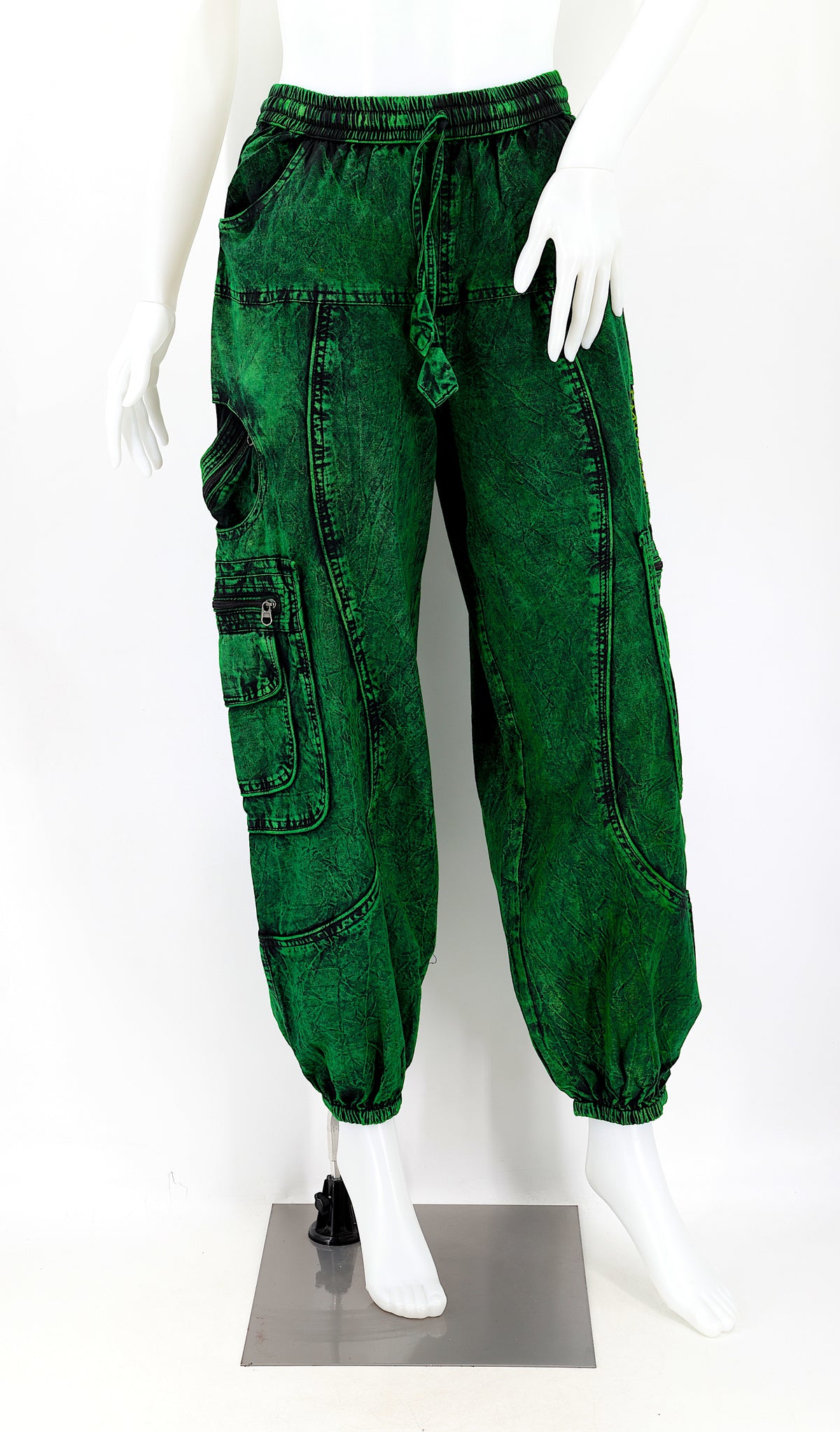 Front view of dark green handmade cotton harem pants with Flower of Life embroidery