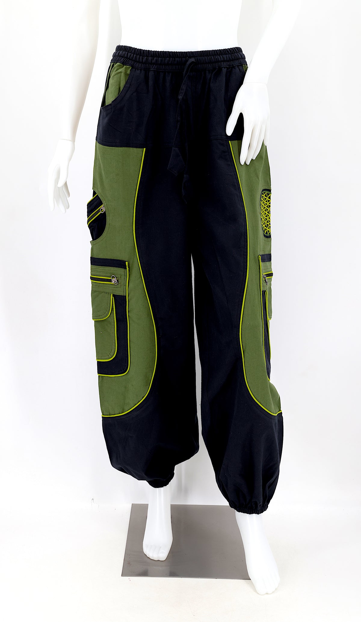 Front view of black green handmade cotton harem pants with Flower of Life embroidery
