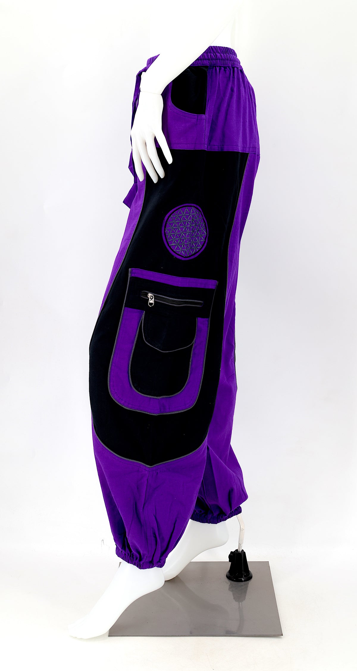 Side view showing relaxed fit and pocket detail of boho harem trousers