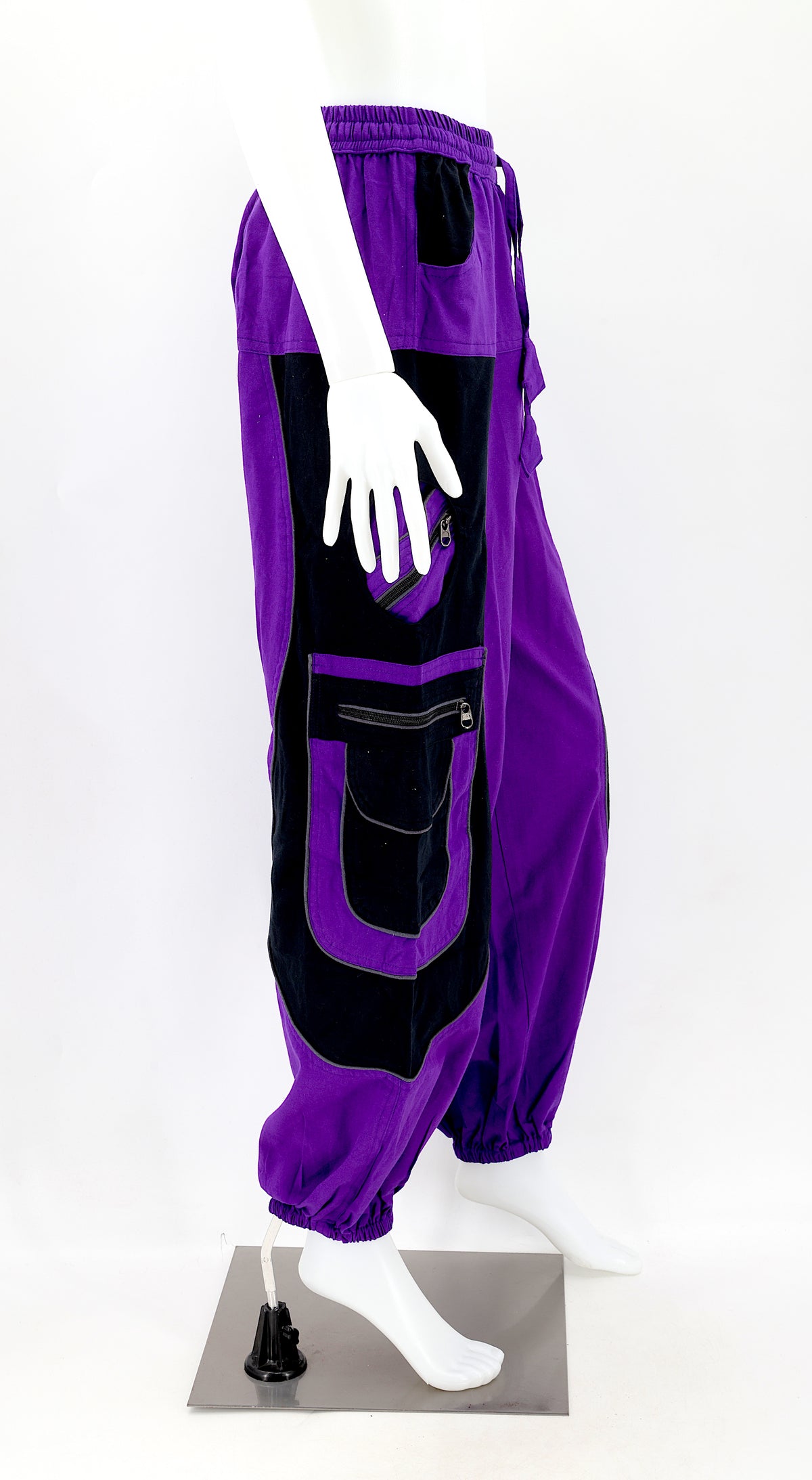 Right side view showing relaxed fit and pocket detail of purple boho harem trousers