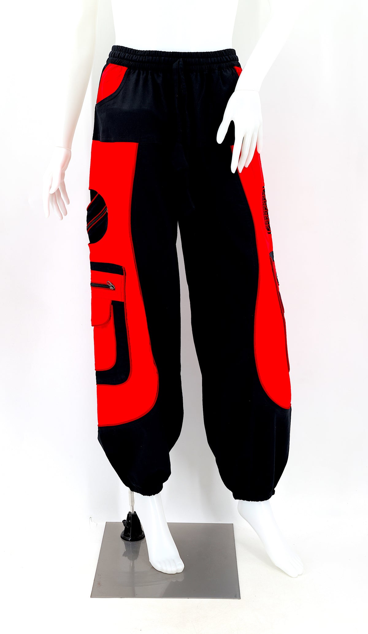 Front view of black red handmade cotton harem pants with Flower of Life embroidery