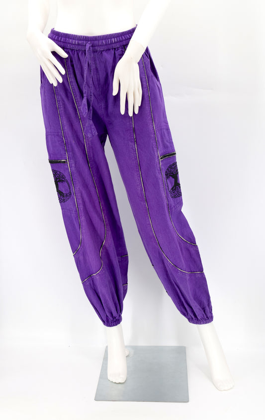Front view of purple handmade Tree of Life embroidered straight-leg harem pants