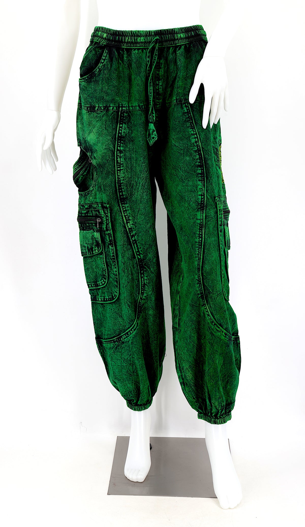 Front view of dark green handmade cotton harem pants with Flower of Life embroidery