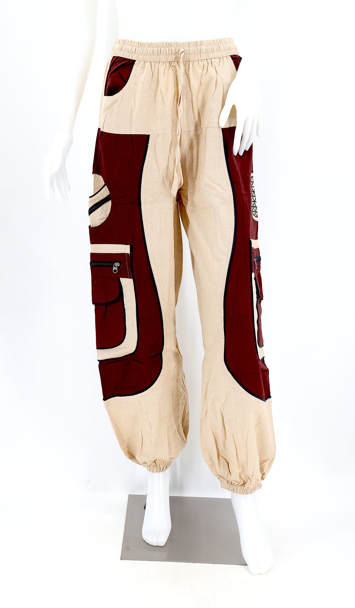 Front view of beige brown handmade cotton harem pants with Flower of Life embroidery