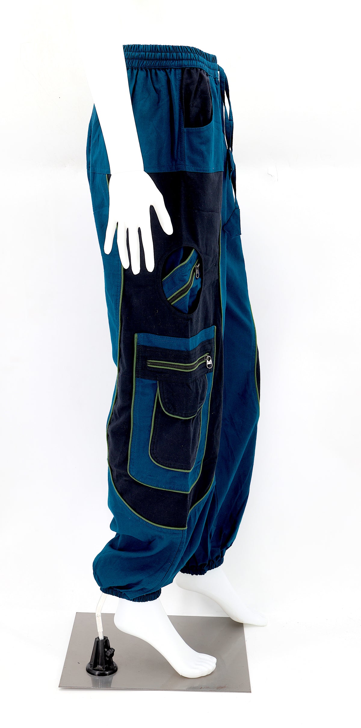 Side view showing relaxed fit and pocket detail of teal blue boho harem trousers