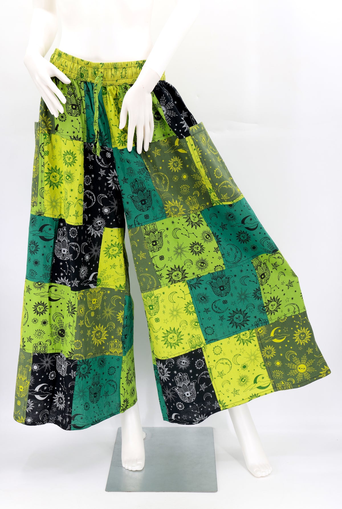 Front view of handmade celestial print wide-leg patchwork harem pants in natural cotton