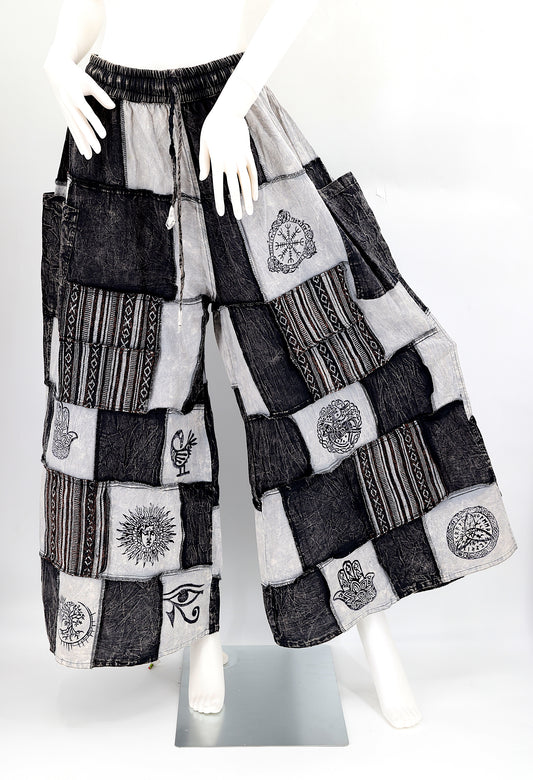 Bohemian harem pants with Old Gods symbolic patchwork and wide-leg design, handmade from natural cotton