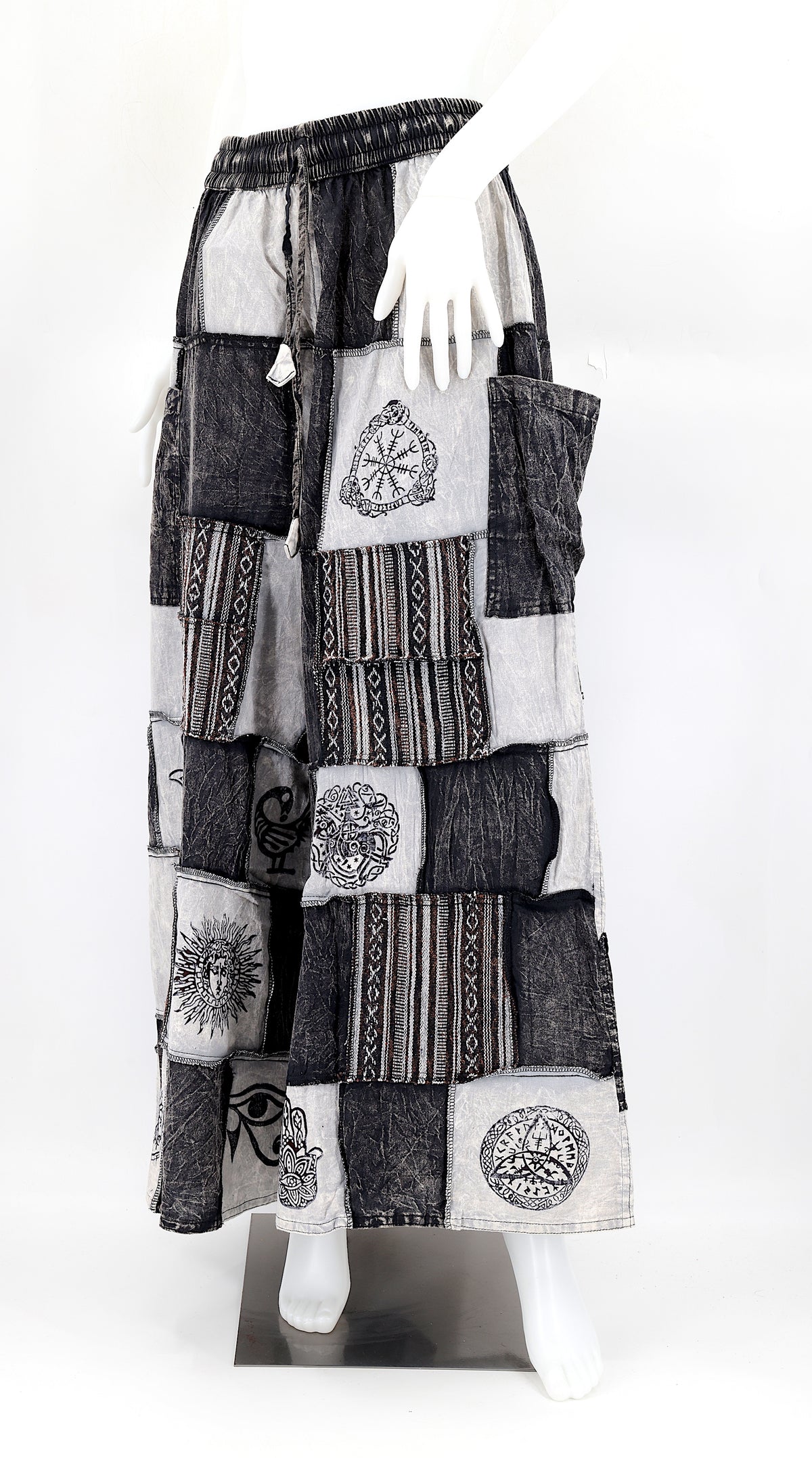 Bohemian harem pants with Old Gods symbolic patchwork and wide-leg design, handmade from natural cotton