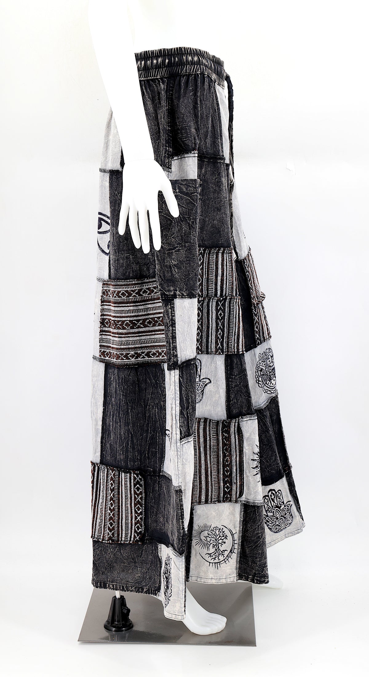 Side profile of hippie-style harem trousers with mystical Old Gods symbols and deep side pockets