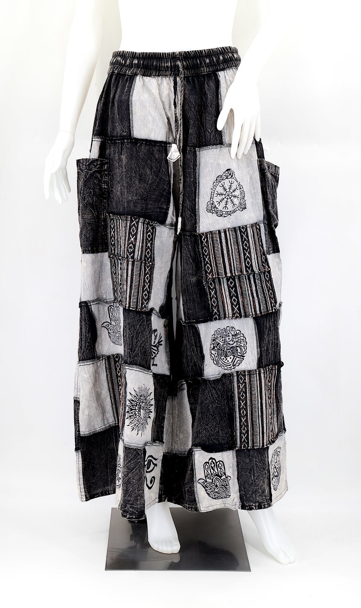 Bohemian harem pants with Old Gods symbolic patchwork and wide-leg design, handmade from natural cotton