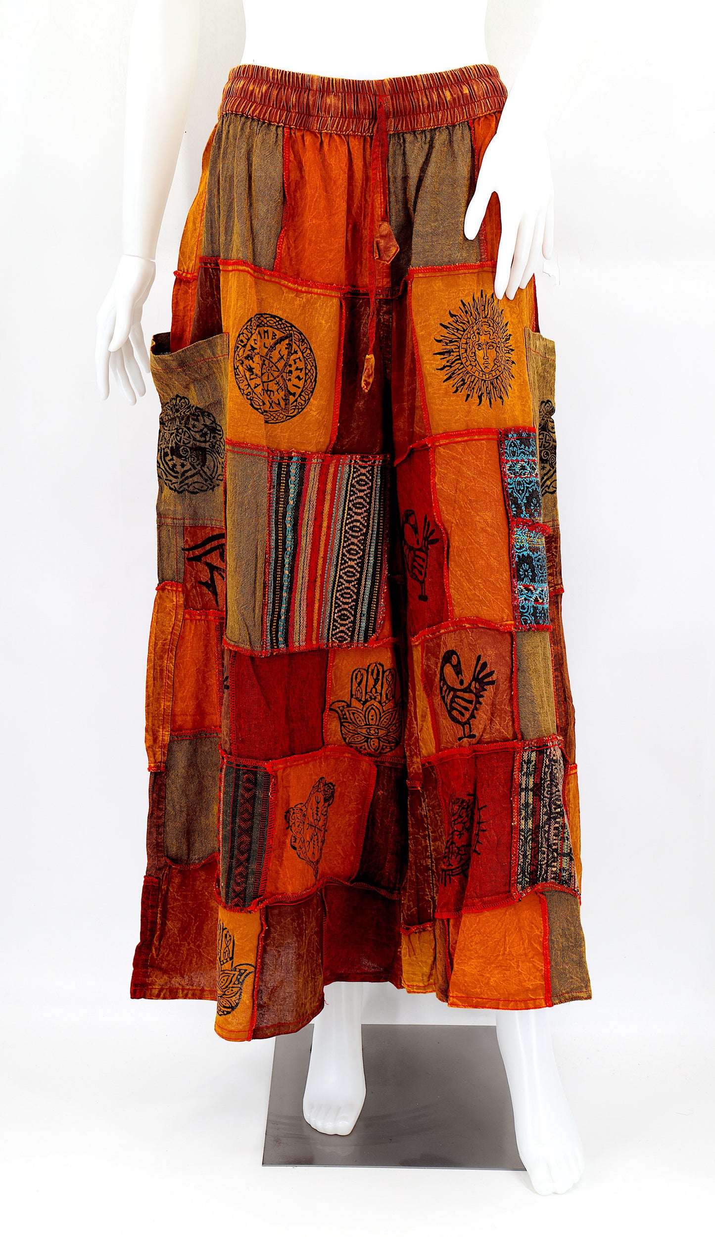 Bohemian harem pants with Old Gods symbolic patchwork and wide-leg design, handmade from natural cotton
