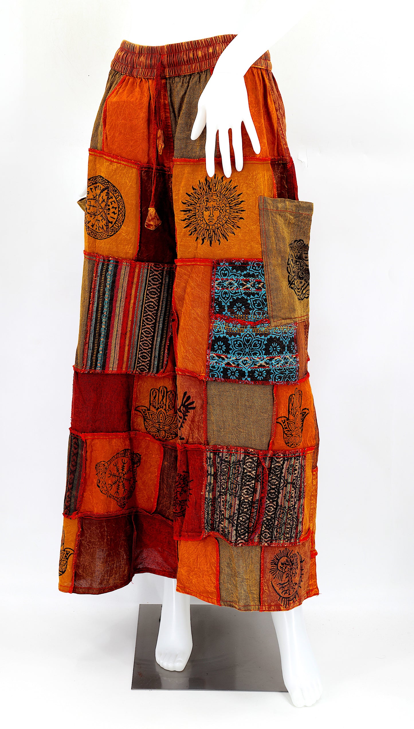 Bohemian harem pants with Old Gods symbolic patchwork and wide-leg design, handmade from natural cotton