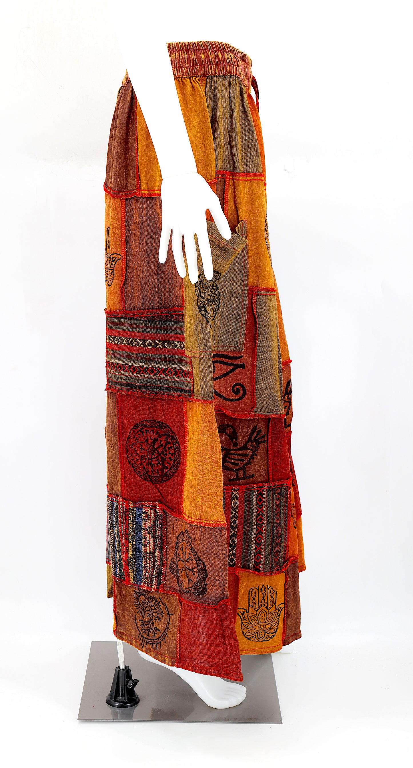Side profile of hippie-style harem trousers with mystical Old Gods symbols and deep side pockets