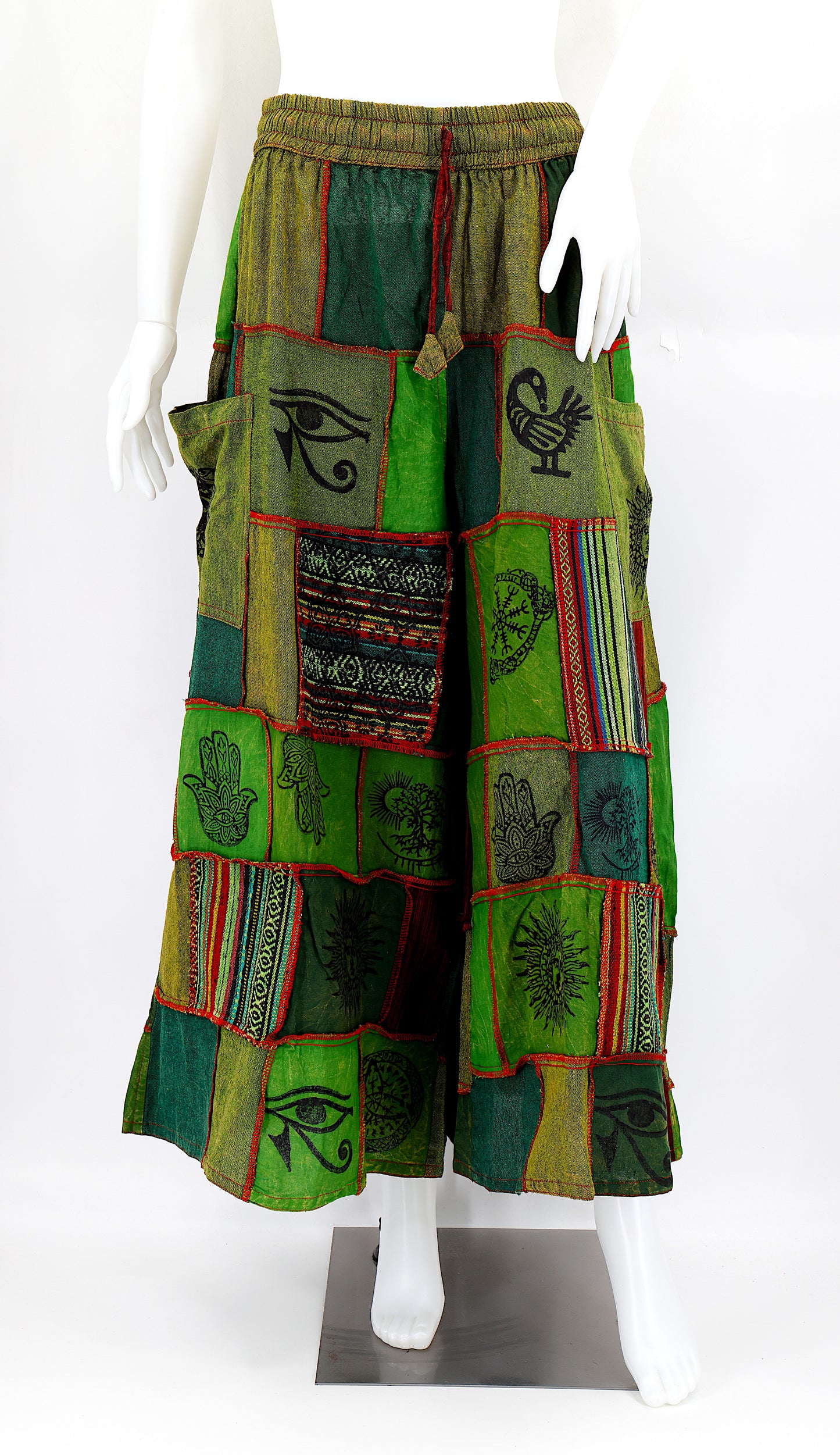 Bohemian harem pants with Old Gods symbolic patchwork and wide-leg design, handmade from natural cotton