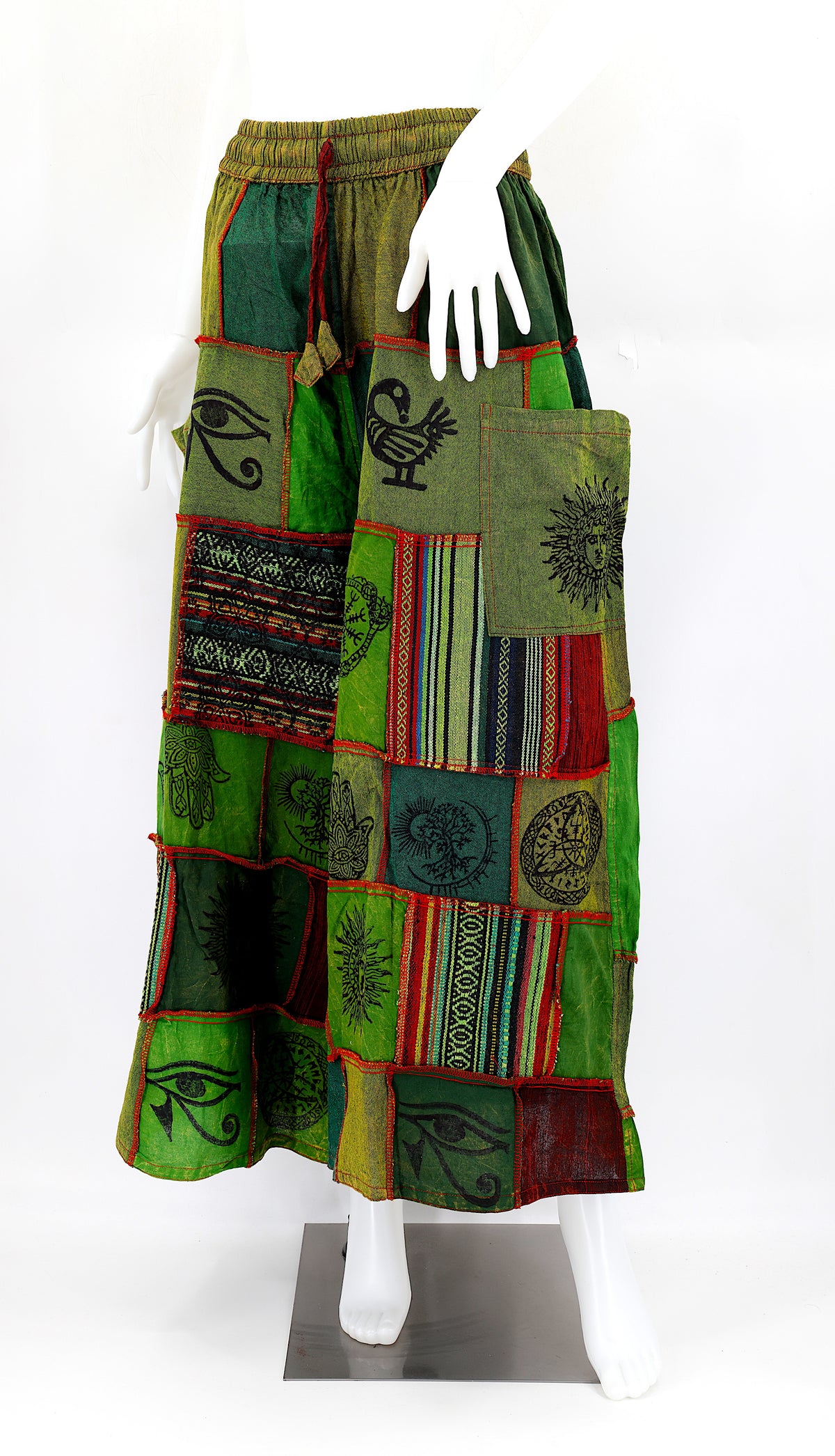 Bohemian harem pants with Old Gods symbolic patchwork and wide-leg design, handmade from natural cotton