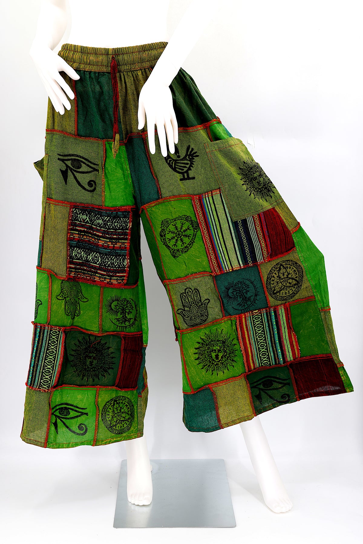 Bohemian harem pants with Old Gods symbolic patchwork and wide-leg design, handmade from natural cotton