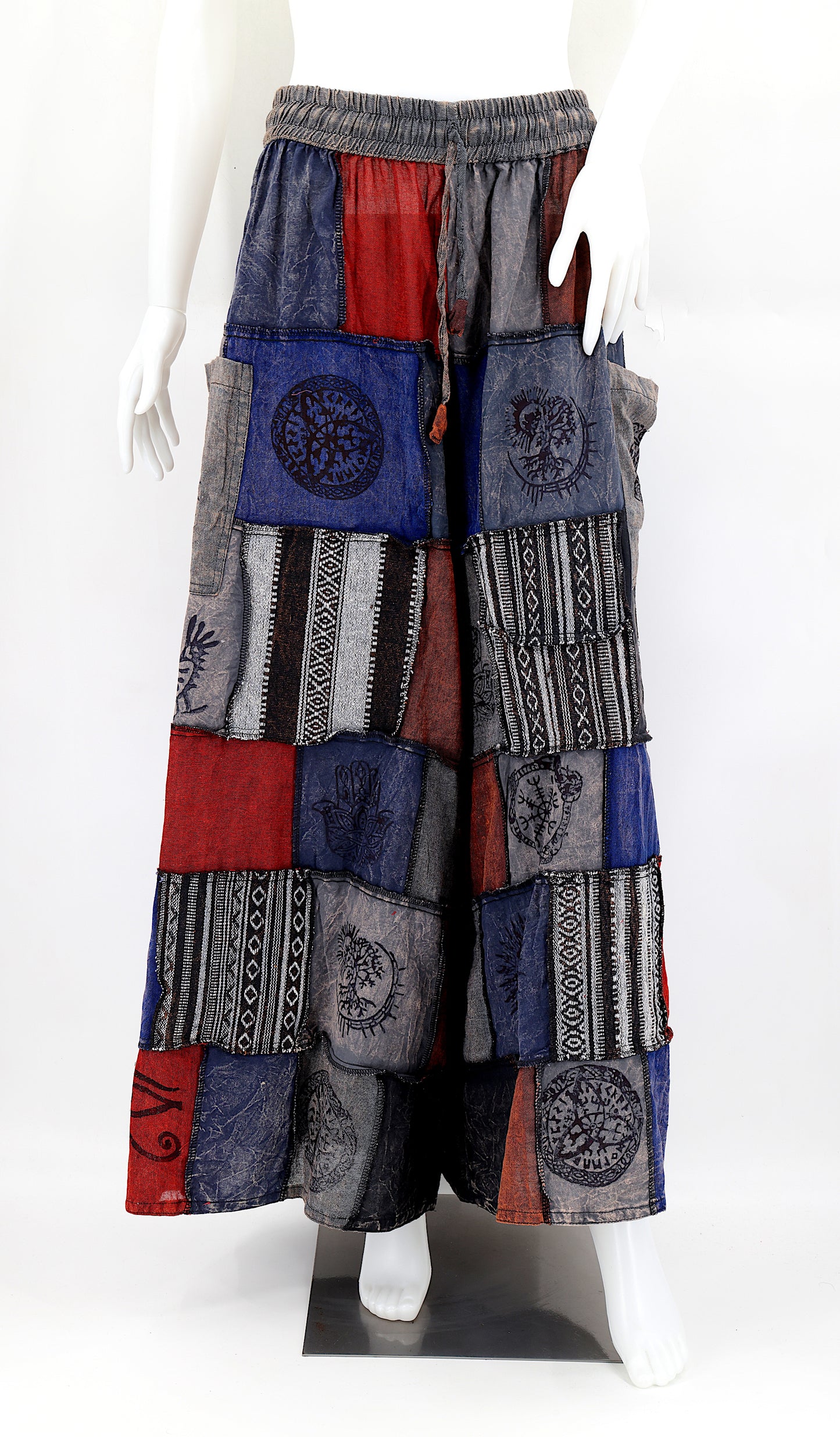 Bohemian harem pants with Old Gods symbolic patchwork and wide-leg design, handmade from natural cotton