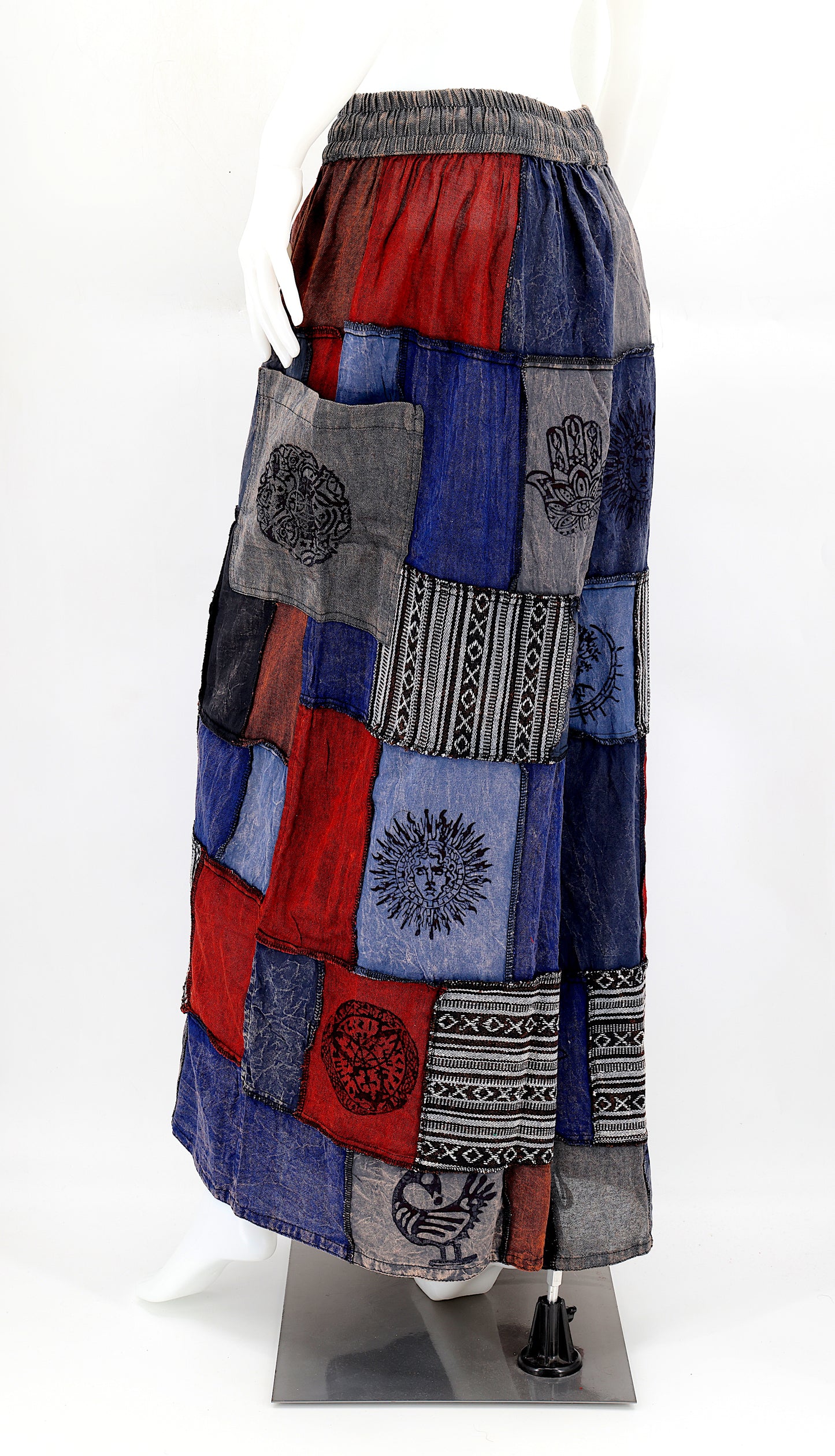 Back view of wide-leg cotton harem pants featuring ancient symbol designs
