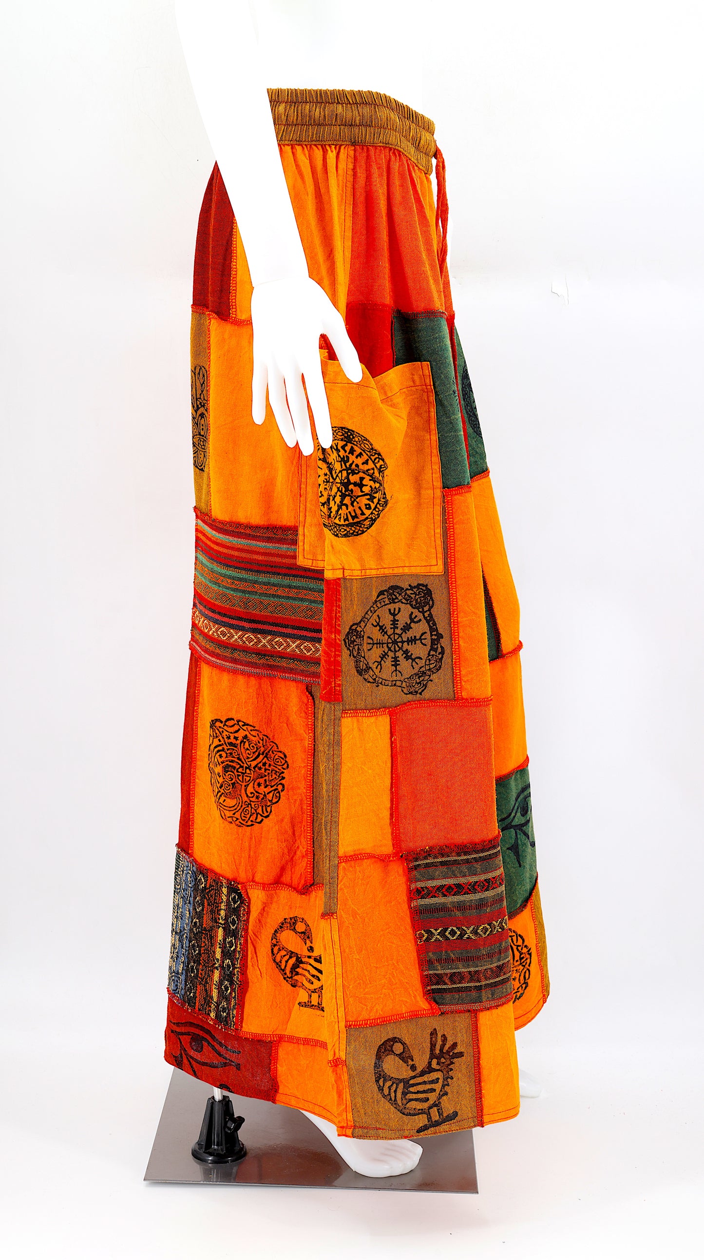 Side profile of hippie-style harem trousers with mystical Old Gods symbols and deep side pockets