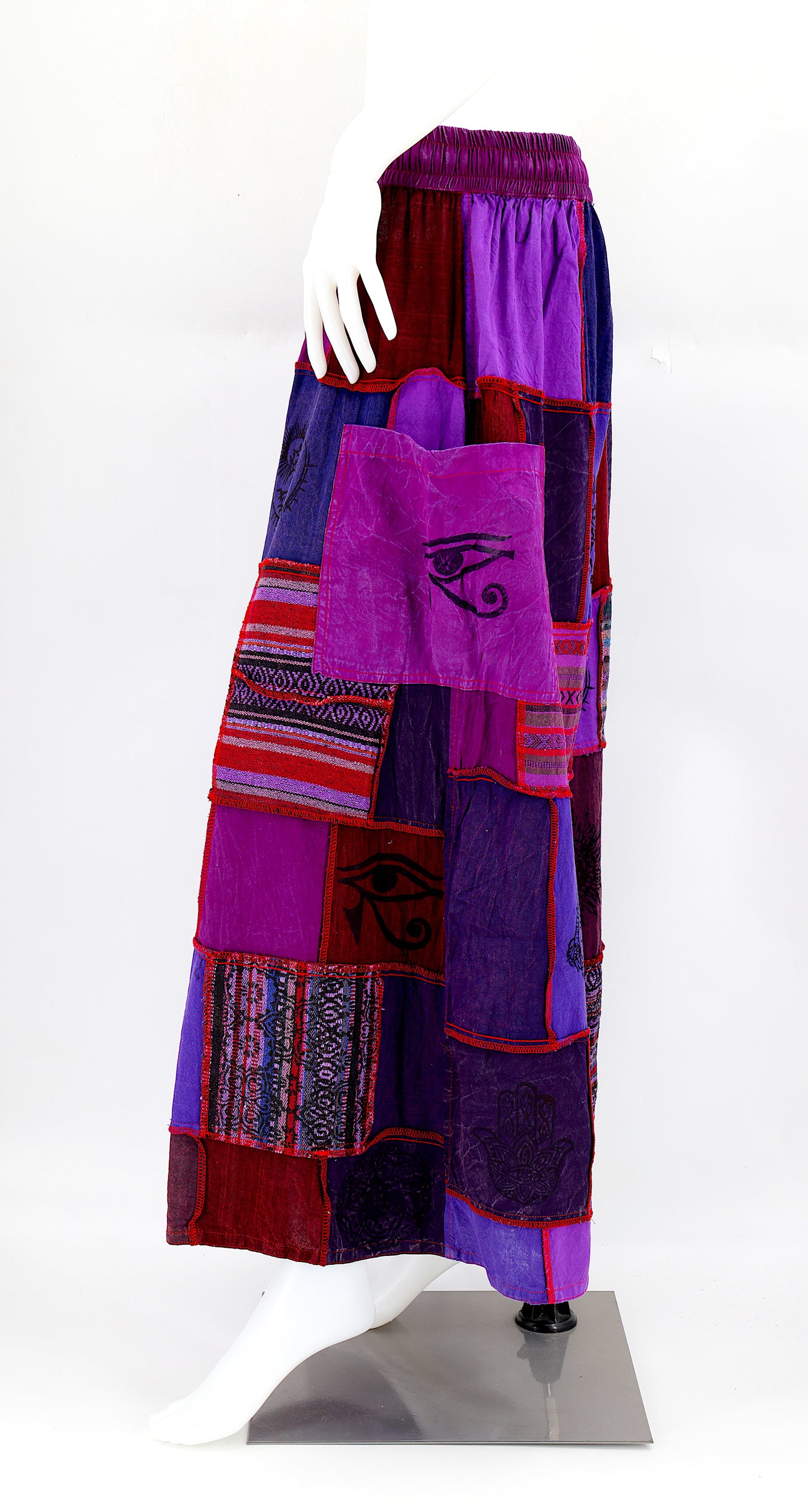 Side profile of hippie-style harem trousers with mystical Old Gods symbols and deep side pockets