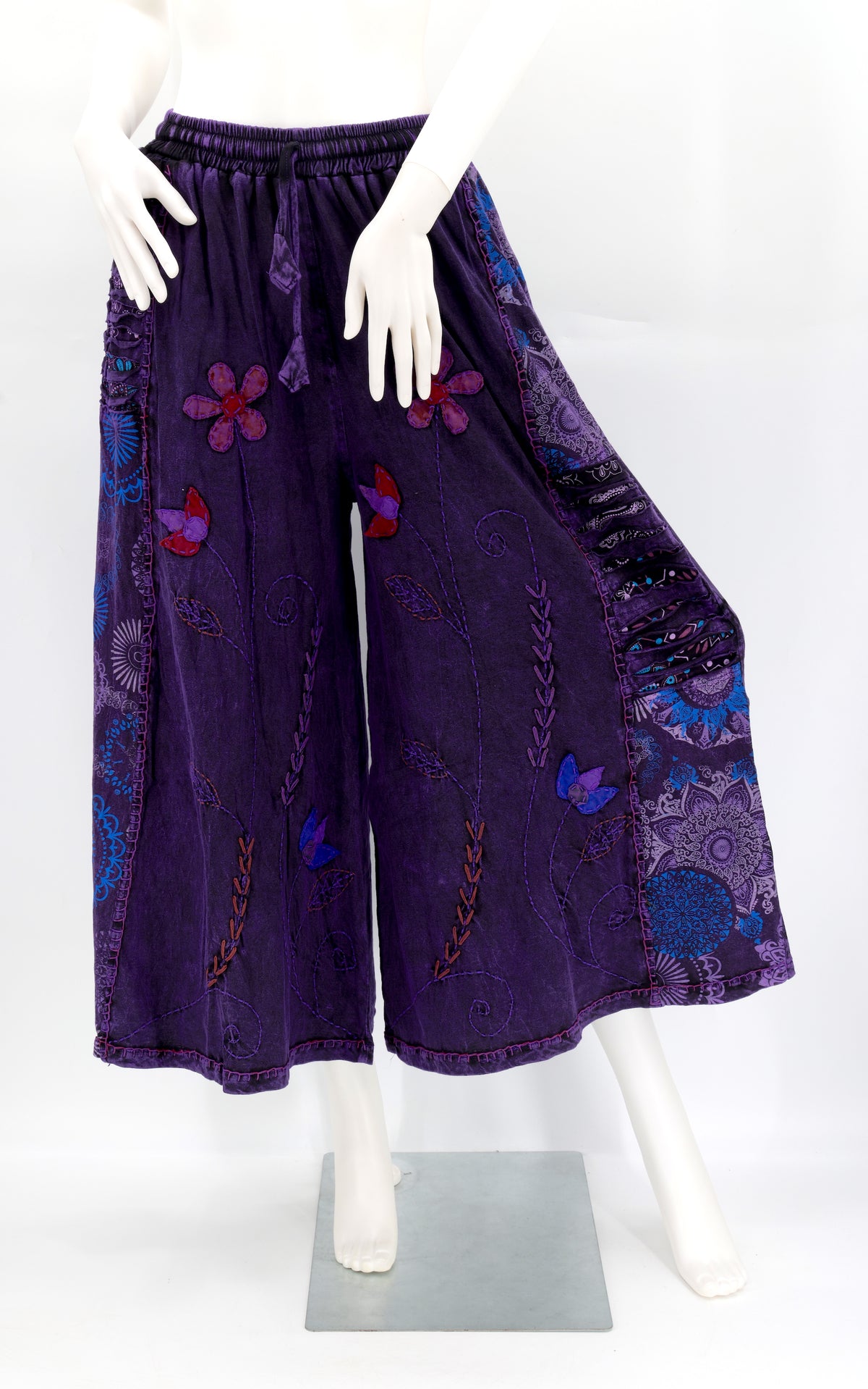 Artistic Floral embroidered patterns on eco-friendly, breathable handwoven cotton.
