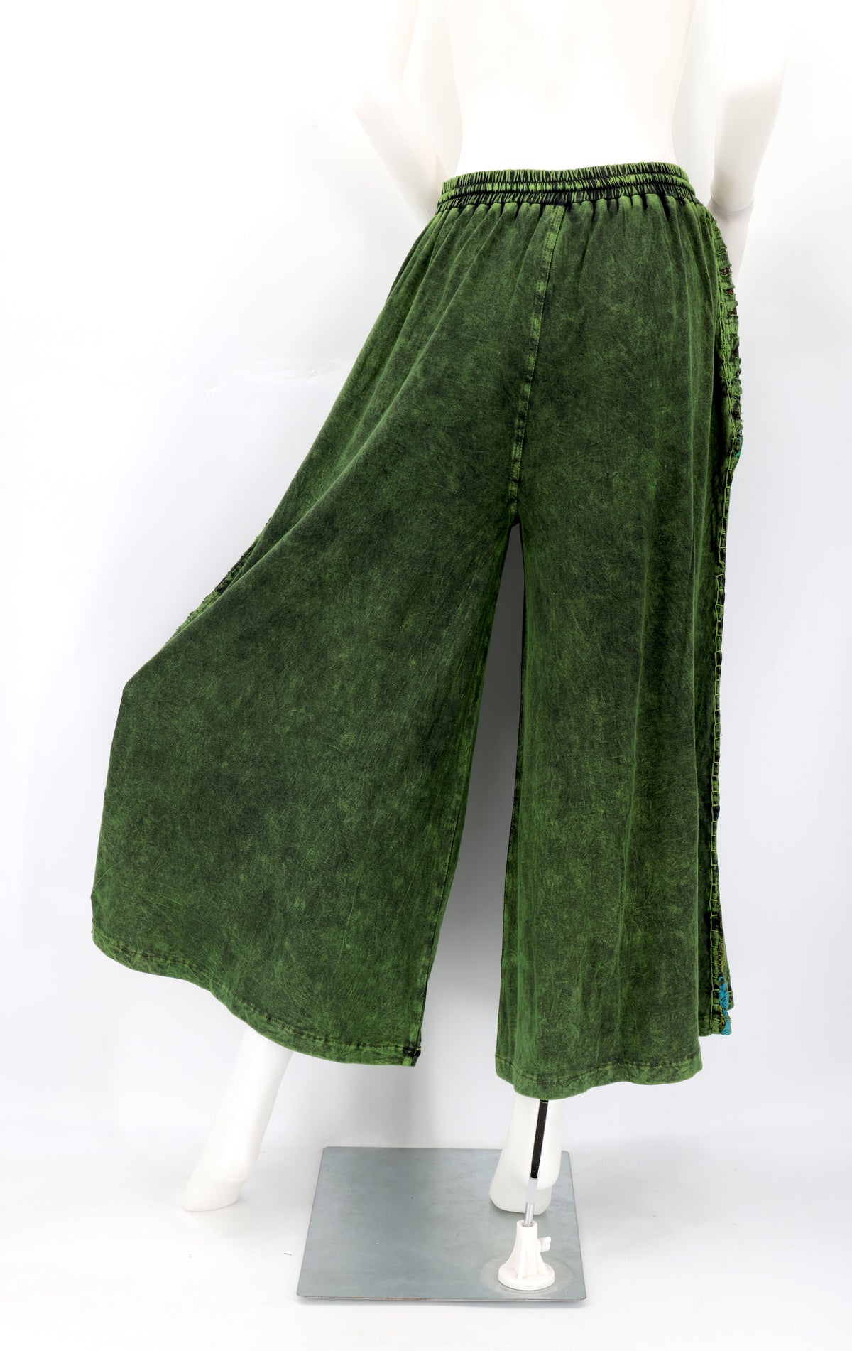 Back view of Himalayan handmade cotton trousers with natural embroidery pattern.