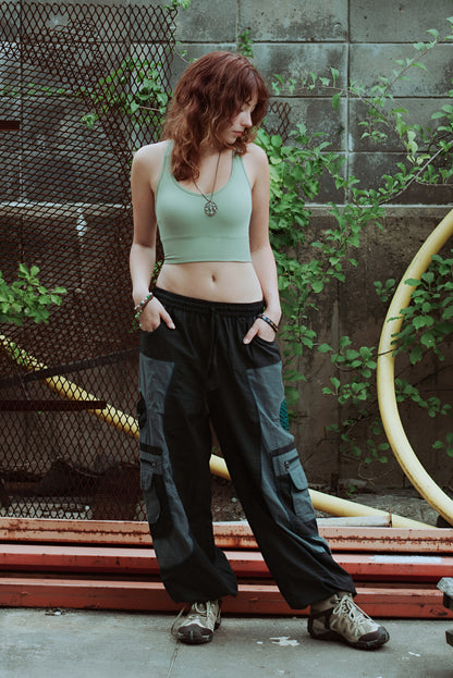Model wearing boho-style harem pants in outdoor natural setting
