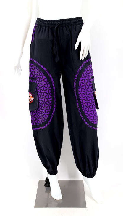 Front view of embroidered mushroom harem trousers