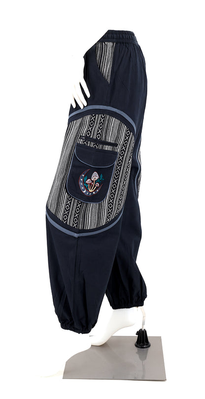 Side view highlighting secure zippered and buttoned pockets