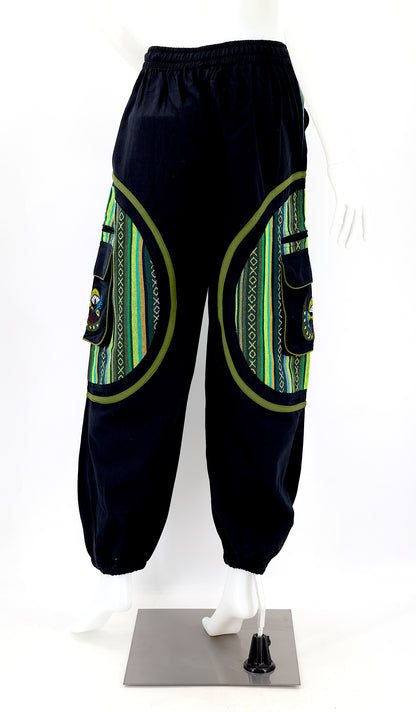 Back view of handmade moon and mushroom embroidered straight-leg harem pants