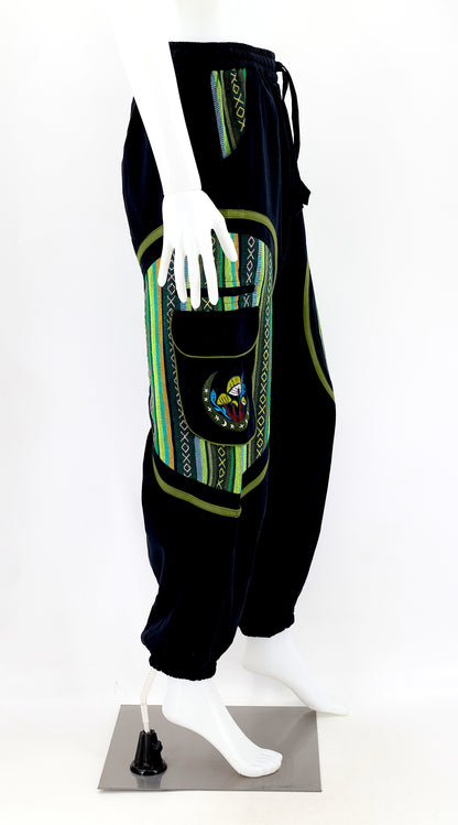 Side view highlighting secure zippered and buttoned pockets