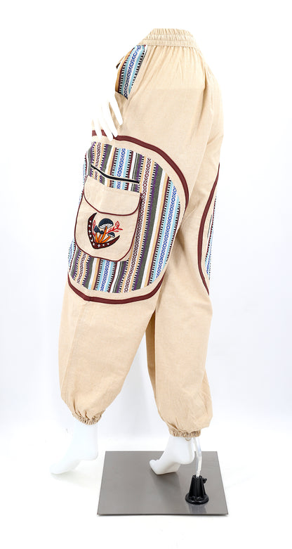 Back view of handmade moon and mushroom embroidered straight-leg harem pants