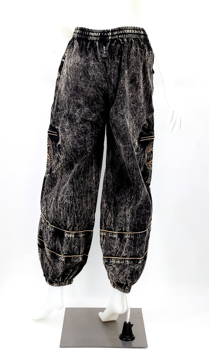 Back view of black handmade Tree of Life embroidered straight-leg harem pants
