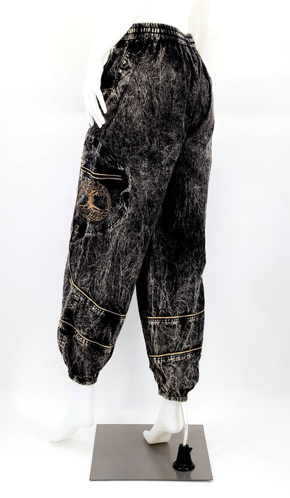Back view of black handmade Tree of Life embroidered straight-leg harem pants