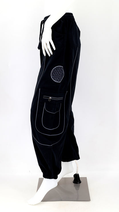 Side view showing relaxed fit and pocket detail of boho harem trousers