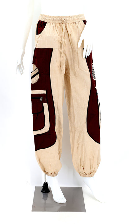 Front view of beige brown handmade cotton harem pants with Flower of Life embroidery