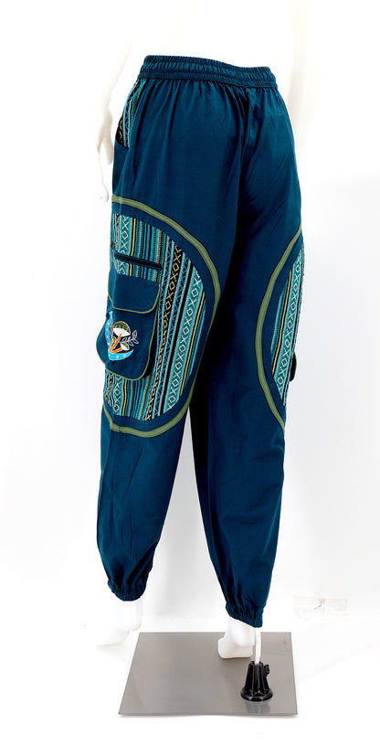 Back view of handmade moon and mushroom embroidered straight-leg harem pants