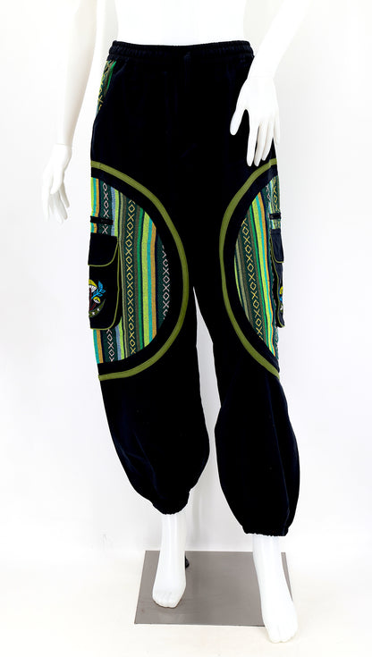 Front view of handmade moon and mushroom embroidered straight-leg harem pants